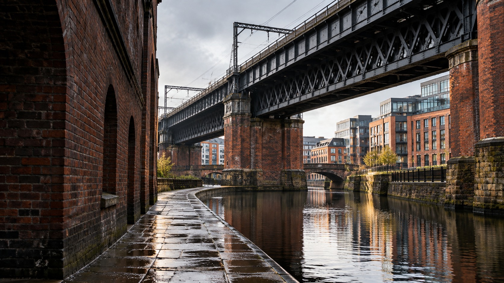 Industrial railway bridge and canal architecture in Manchester